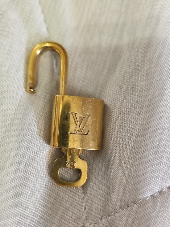 Louis Vuitton Accessories - Louis Vuitton Gold Tone Lock And Key with LV Monogram